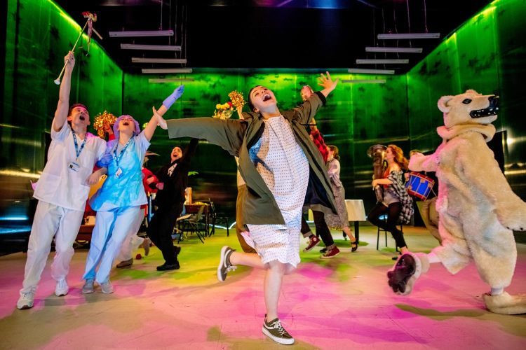 Actors dance on the stage of Earthquakes in London